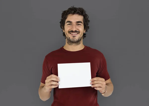 Hombre sosteniendo pancarta — Foto de Stock