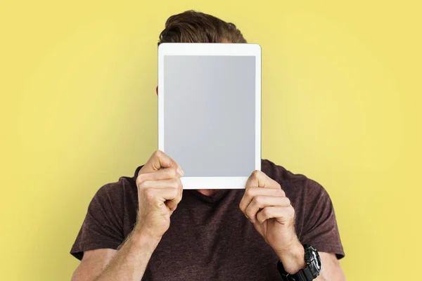 person holding digital tablet