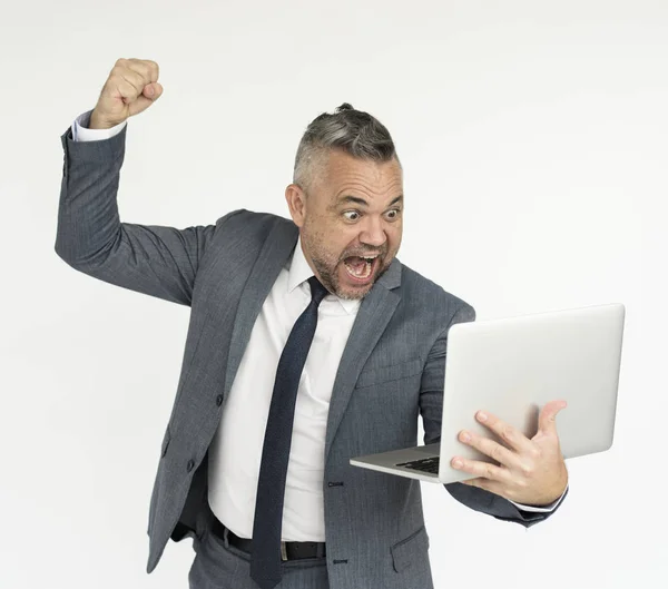 Hombre excitado con portátil — Foto de Stock