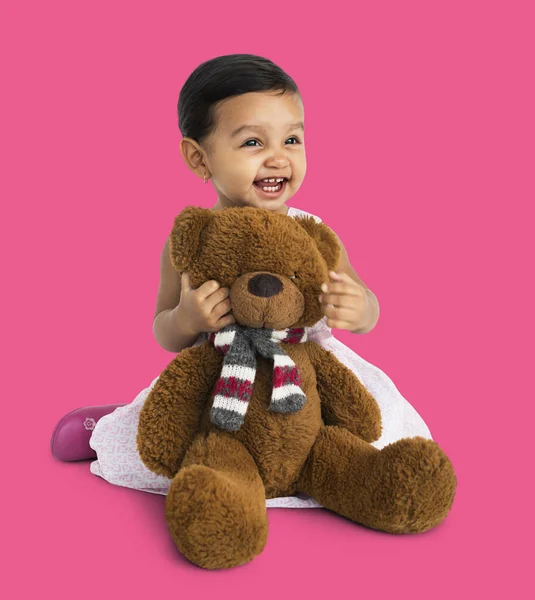 Girl holding teddy bear — Stock Photo, Image