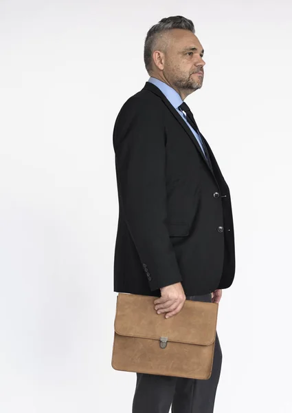Зрілий бізнесмен з портфелем — стокове фото