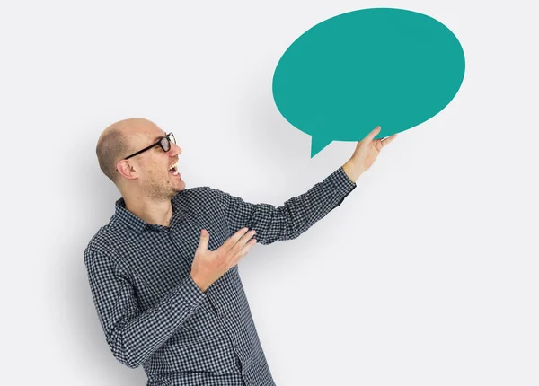 Man holding Speech Bubble — Stock Photo, Image