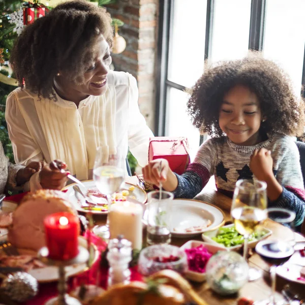 Family celebrating Christmas eve at home — Stock Photo, Image