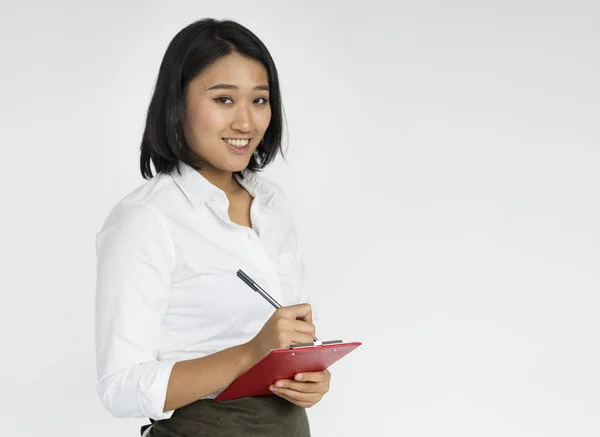 Mujer asiática haciendo notas —  Fotos de Stock
