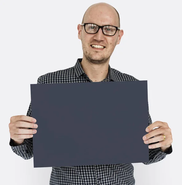 Hombre sosteniendo pancarta —  Fotos de Stock