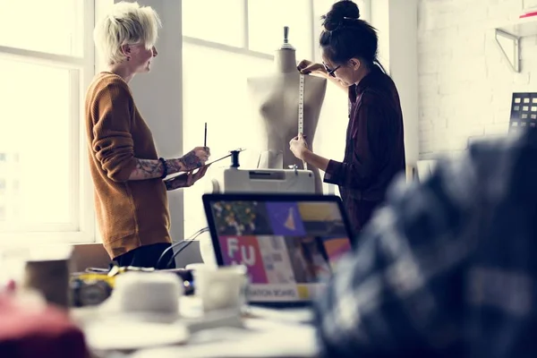 Fashion designers working in Showroom — Stock Photo, Image