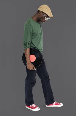 Vinil disk tutan adam