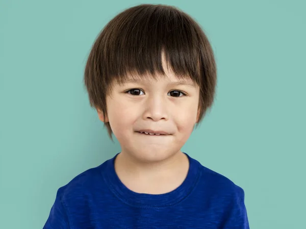 Leuke Aziatische jongen lip bijten — Stockfoto