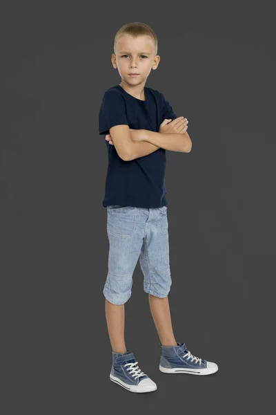 Serious Little Boy with crossed arms — Stock Photo, Image