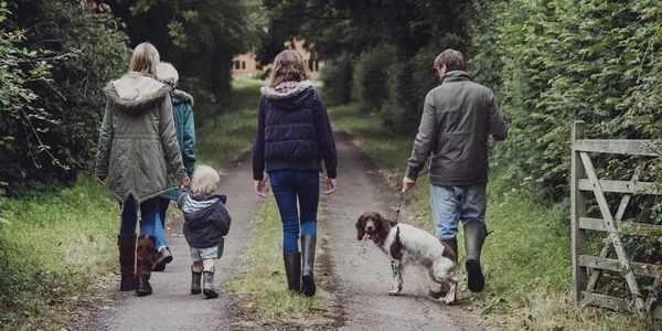 Family Walking with Dog — Stock Photo, Image