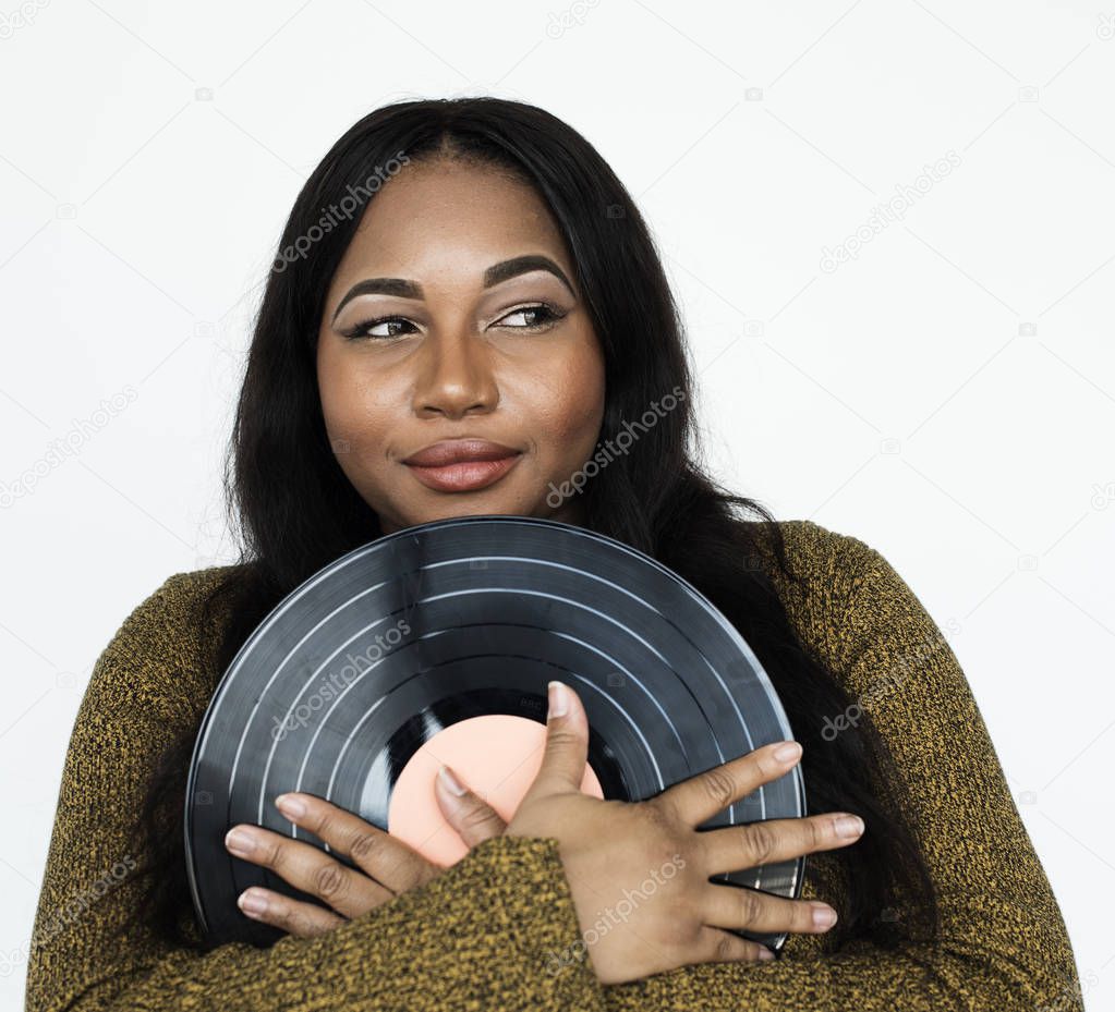 African Woman holding vinyl record