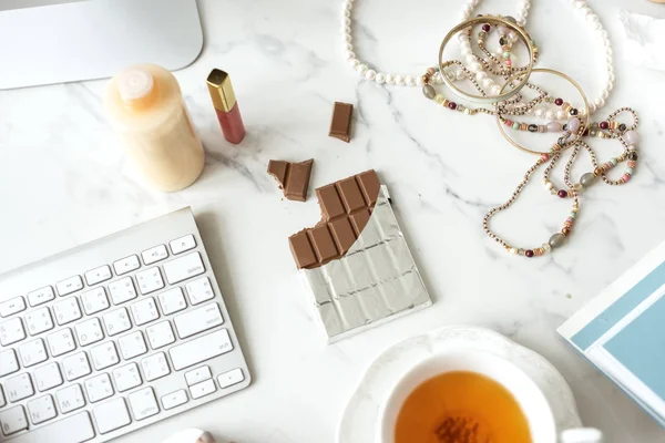 Chocolate and tea cup — Stock Photo, Image