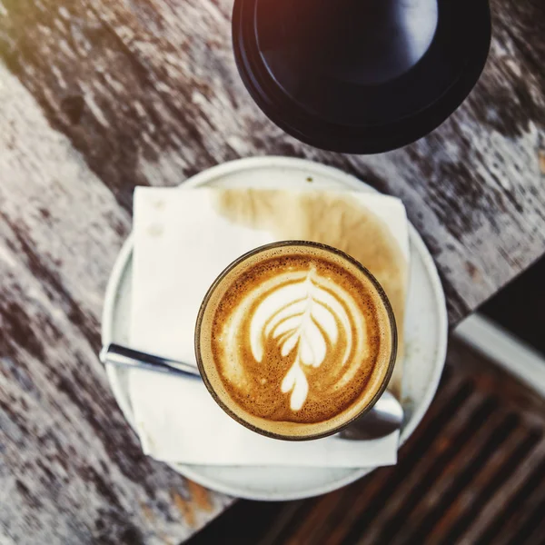 Latte coffee in cup on table — Stock Photo, Image