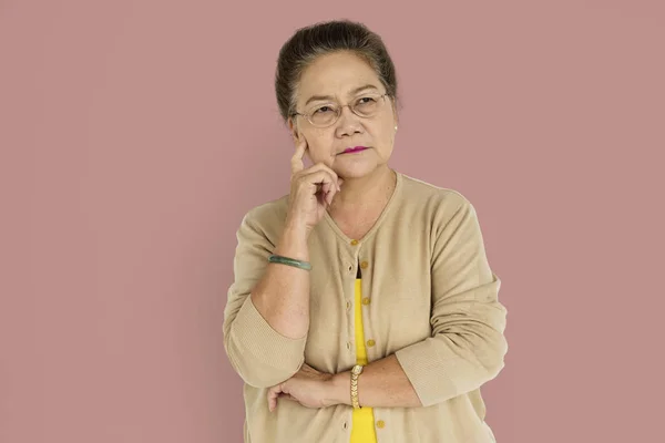 Thoughtful Mature Asian Woman — Stock Photo, Image