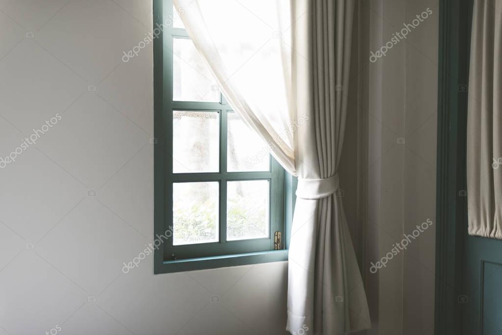 home window with curtains
