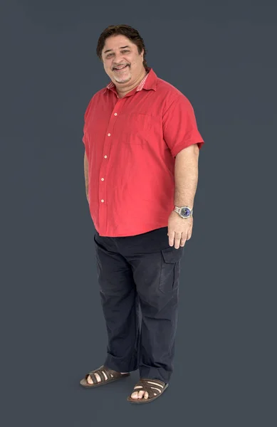 Adult man standing in studio — Stock Photo, Image