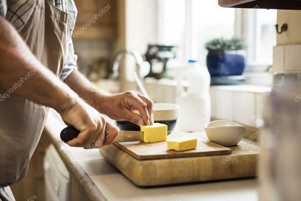 Man Cooking in kitchen