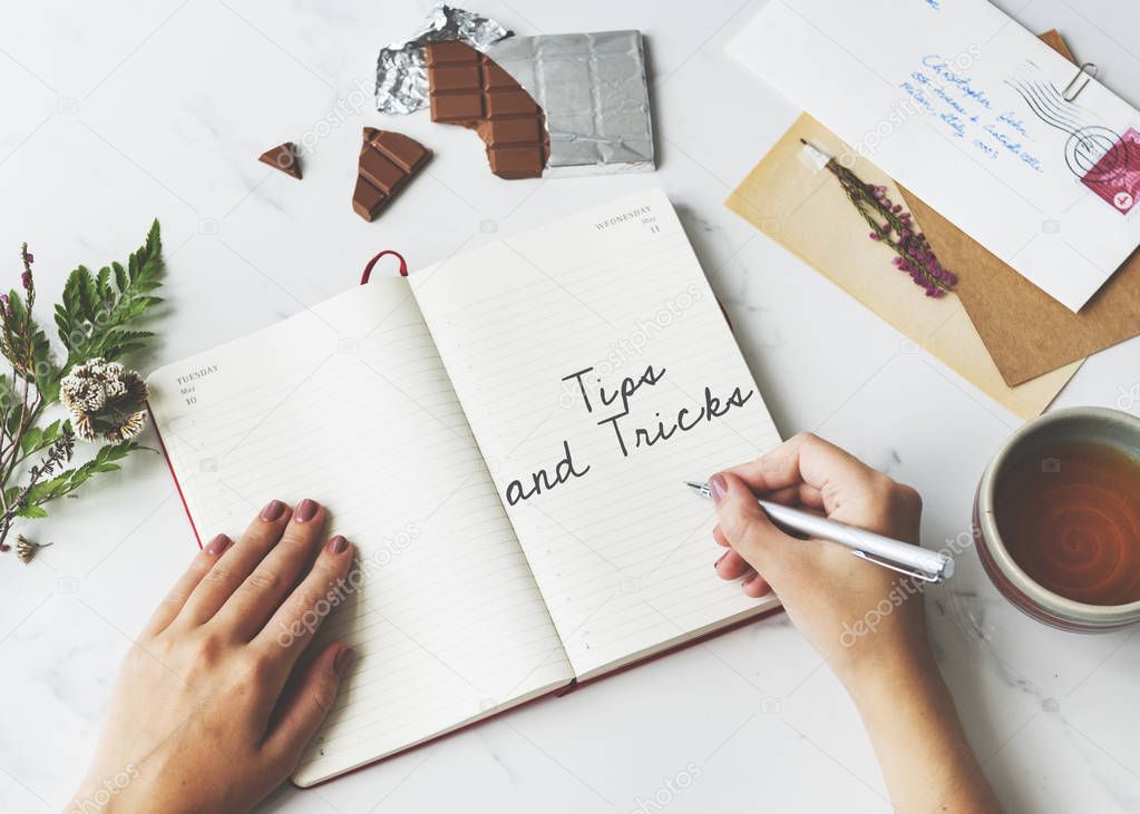 woman writing in notebook