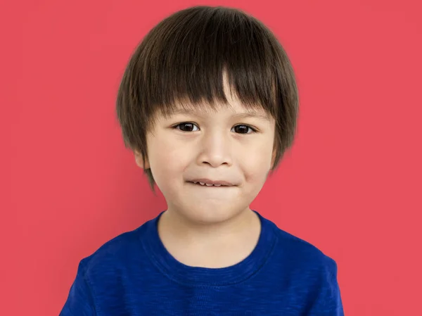 Leuke Aziatische jongen lip bijten — Stockfoto