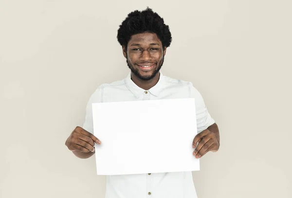 Hombre sosteniendo pancarta — Foto de Stock