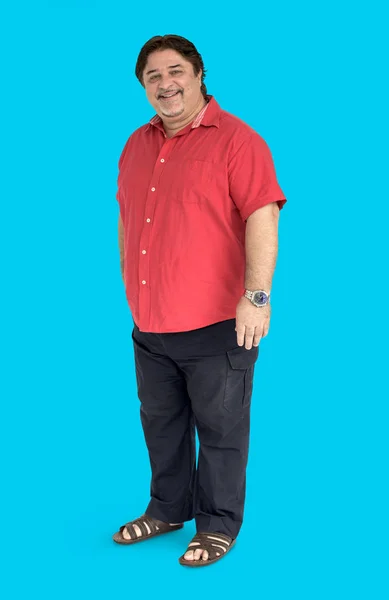 Adult man standing in studio — Stock Photo, Image