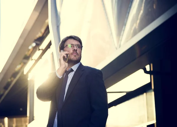 Businessman Talking on mobile phone — Stock Photo, Image