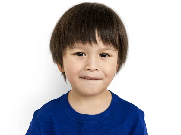 Leuke Aziatische jongen lip bijten — Stockfoto