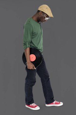 Vinil disk tutan adam