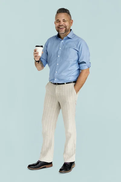 Άντρας που κρατάει φλιτζάνι καφέ — Φωτογραφία Αρχείου