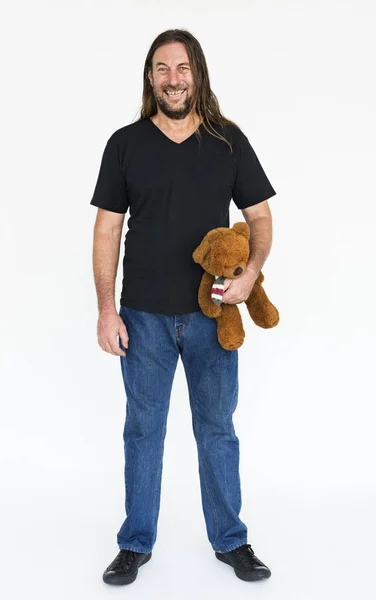 男人抱着一只泰迪熊 — 图库照片