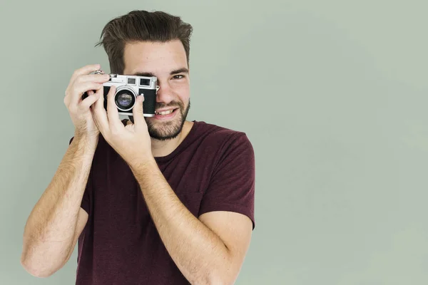 Man taking pictures on camera — Stock Photo, Image