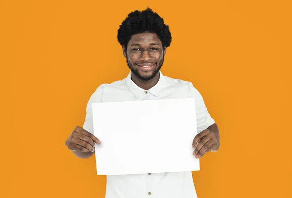 Homem segurando cartaz — Fotografia de Stock