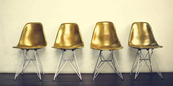 Chairs standing in row — Stock Photo, Image