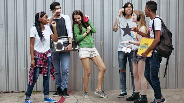 Teenagers chilling together in street — Stock Photo, Image
