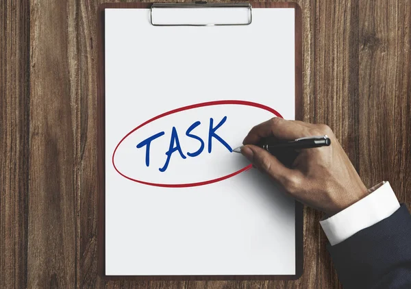 Businessman hand using pen — Stock Photo, Image