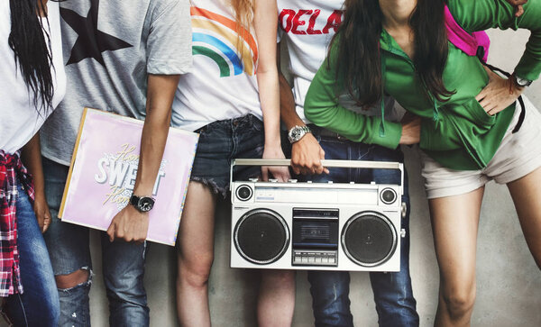 Teenagers with vinyl record and boombox