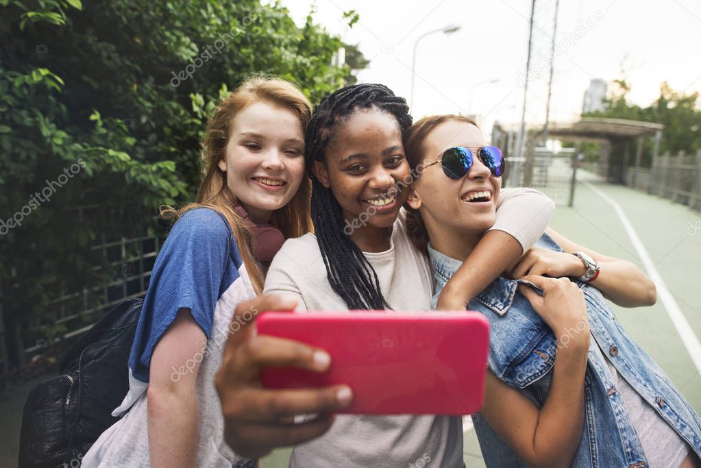 best friends together taking selfie