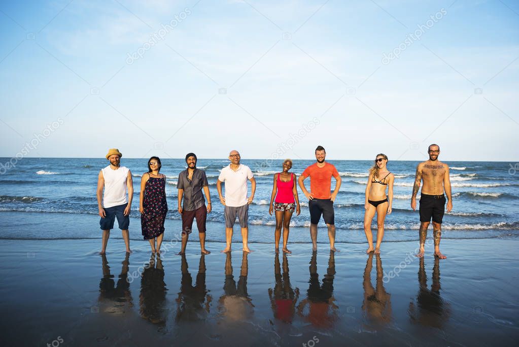 Young People Standing Near Sea 