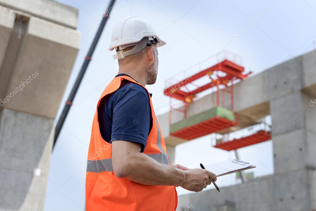 Construction Worker with architecture Plan