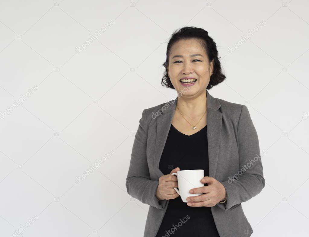 businesswoman holding cup of tea