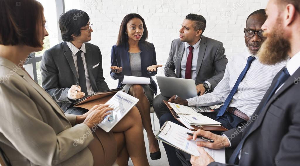 Businesspeople talking at the meeting