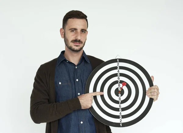 Affärsman holding Dart — Stockfoto