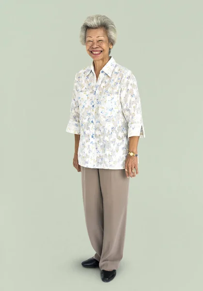 Senior asian Kobieta w studio — Zdjęcie stockowe