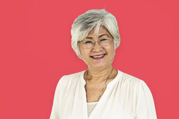 Senior asian woman in the studio — Stock Photo, Image