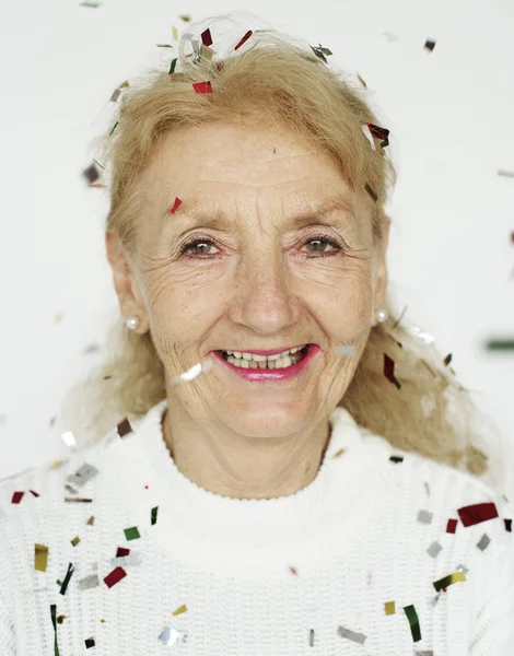 Mulher idosa em partículas — Fotografia de Stock