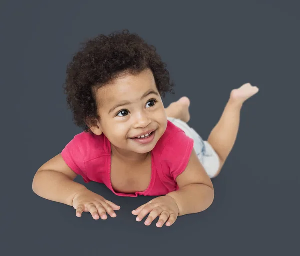 Cute African Child laying on floor — Stock Photo, Image