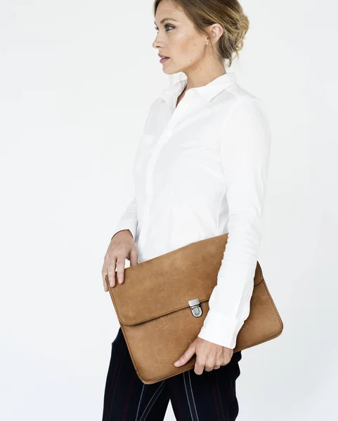 Woman holding bag — Stock Photo, Image