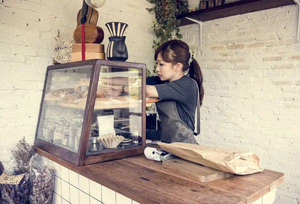 Waitress in baker shop — Stock Photo, Image