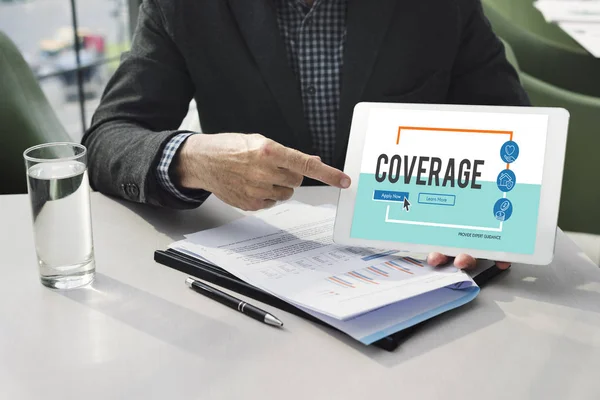 Businessman holding tablet — Stock Photo, Image