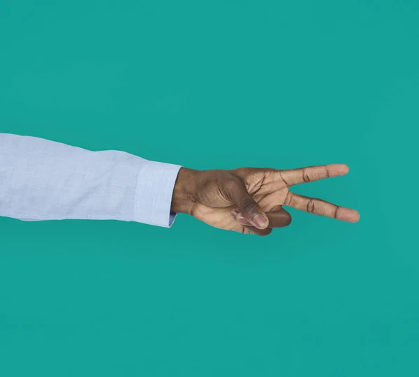 Mänsklig hand visar fred symbol — Stockfoto